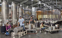 University of California, Davis, students work in the pilot scale J. Lohr Vineyards and Wines Fermentation Room, part of the teaching and research complex located within the university&rsquo;s Robert Mondavi Institute for Wine and Food Science.