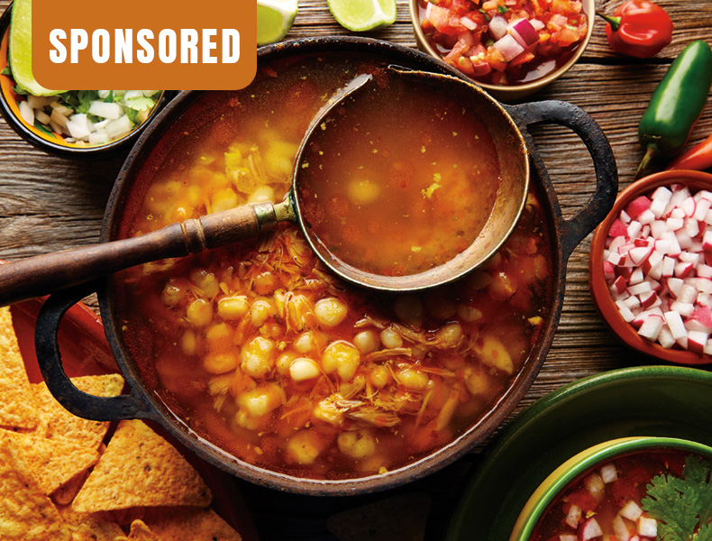 Sponsored. Pozole with mote big corn stew from Mexico with ingredients and appetizer