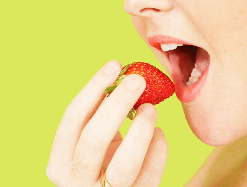 eating a strawberry