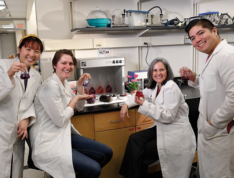 M. Monica Giusti (third from left) and some of her former team members (left to right), Ellia La, Nicole Straathof, and Gonzalo Miyagusuku Cruzado