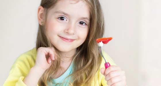 Girl eating salad