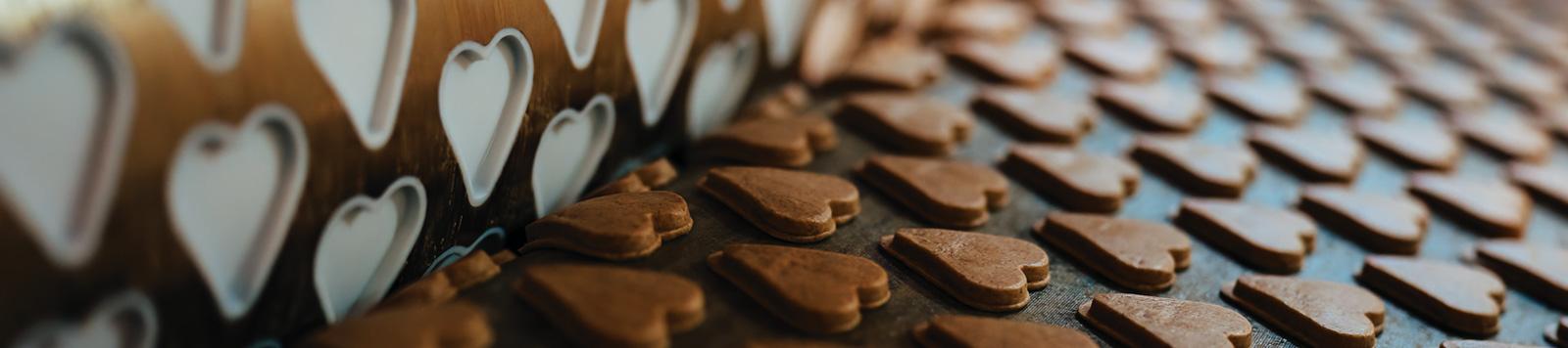 Huge factory line for sweet food and cookies production.
