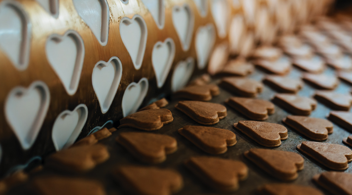 Huge factory line for sweet food and cookies production.